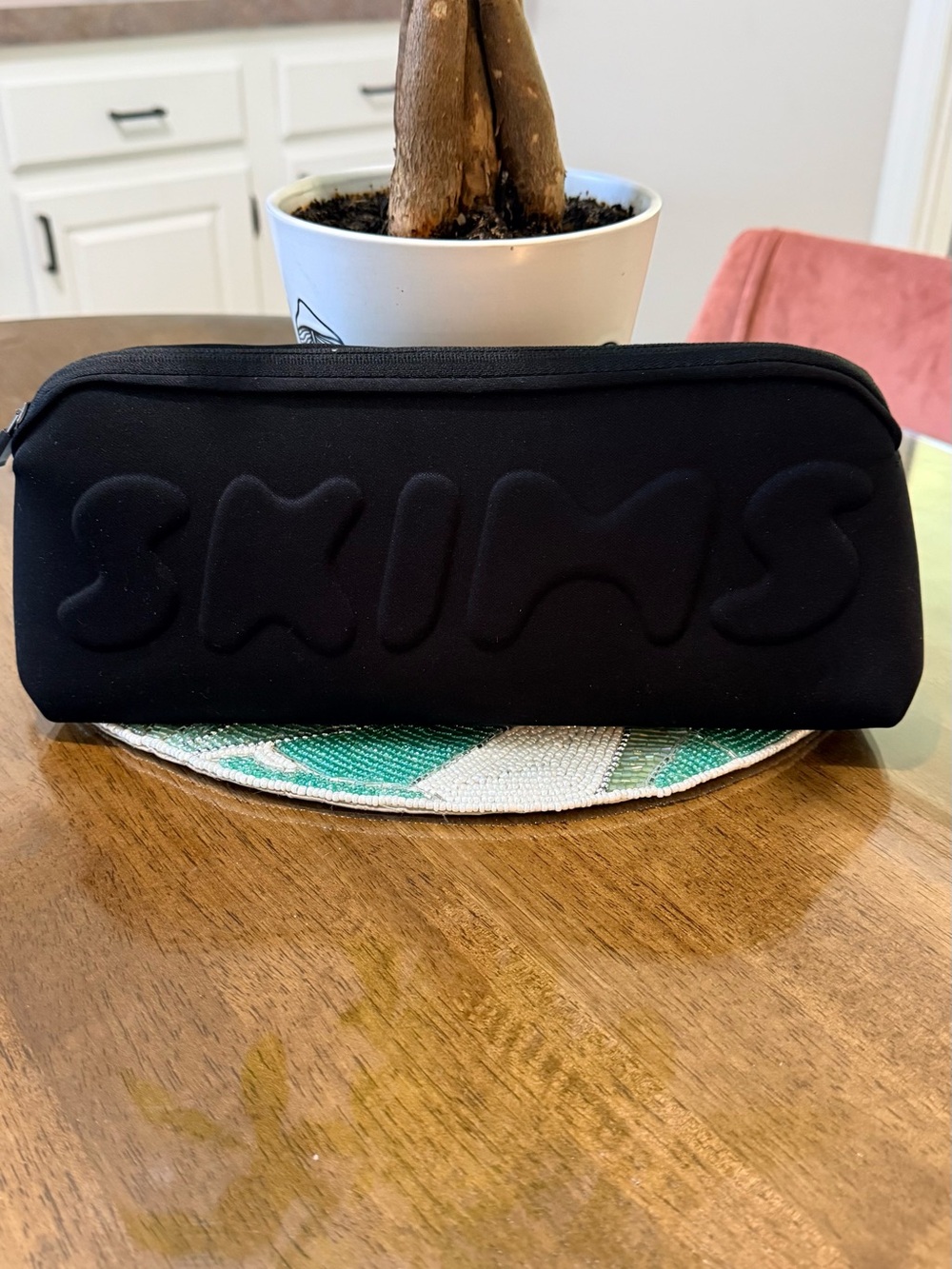 SKIMS Black Neoprene Toiletry Pouch with Raised Logo
